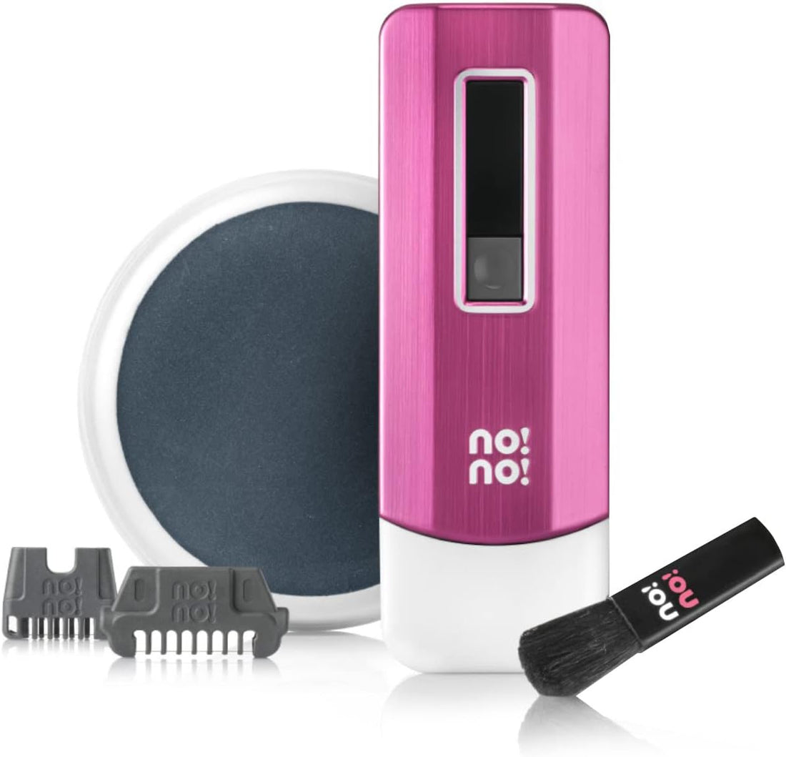 Pink grooming device with attachments on a white background